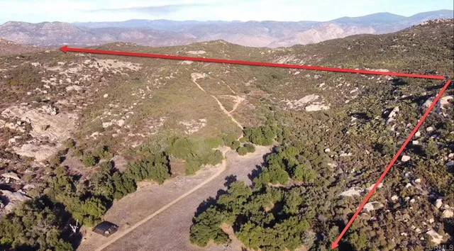 a view of mountain with lake view