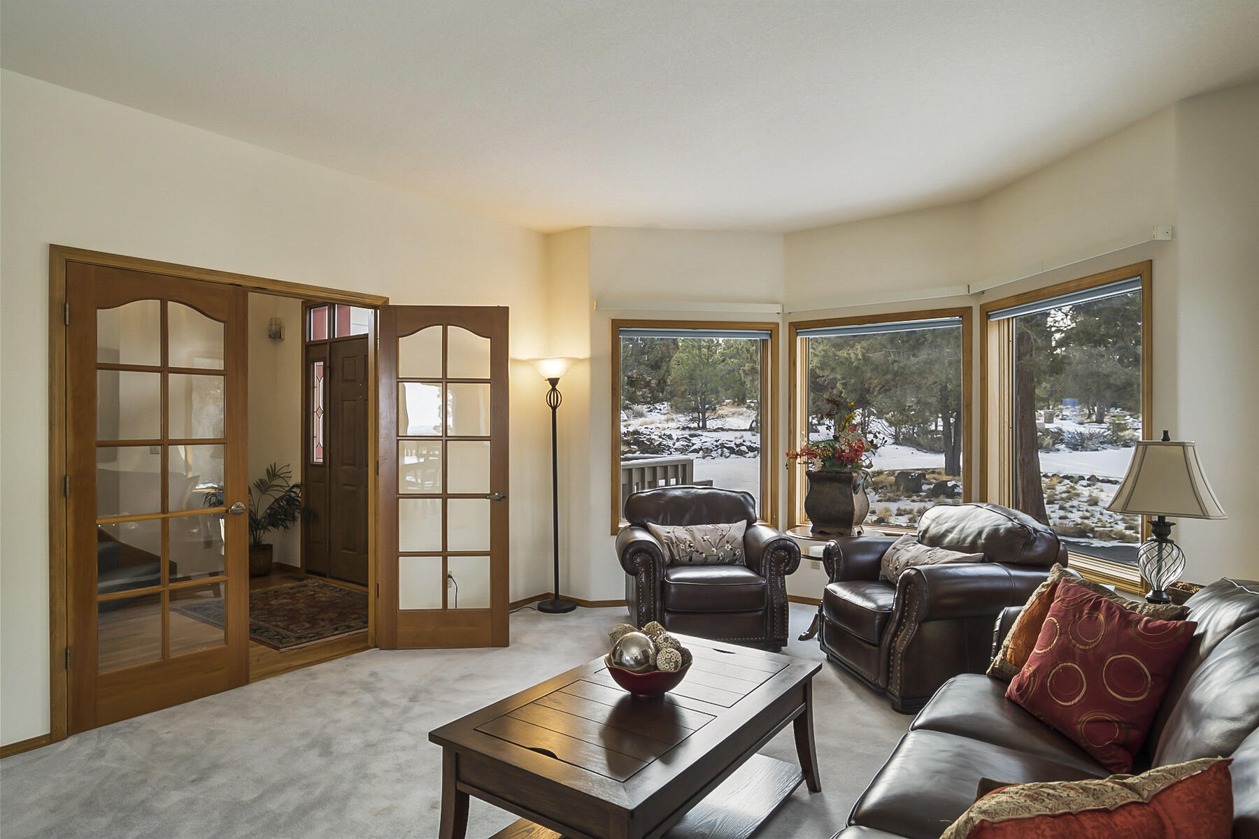 3808 Northwest Summerfield Road Bend, OR 97703 - Photo 4 of 38 Plenty of natural light through the oversized wood-trimmed windows.