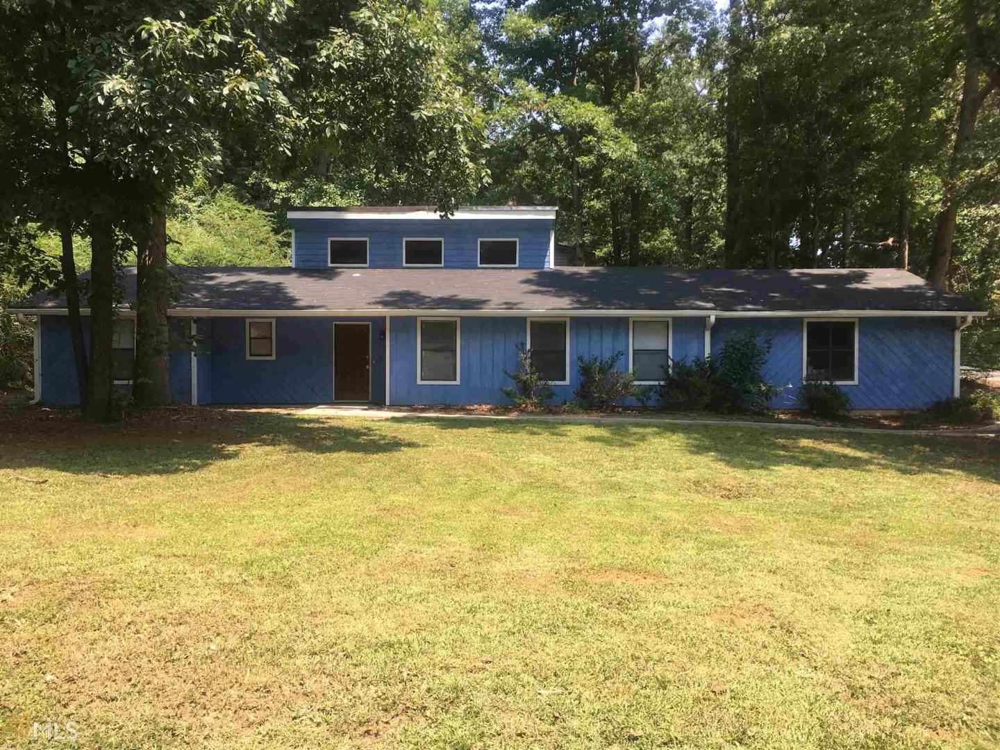 3166 Big Springs Court Decatur, GA 30034 - Photo 1 of 1 a front view of a house with a swimming pool