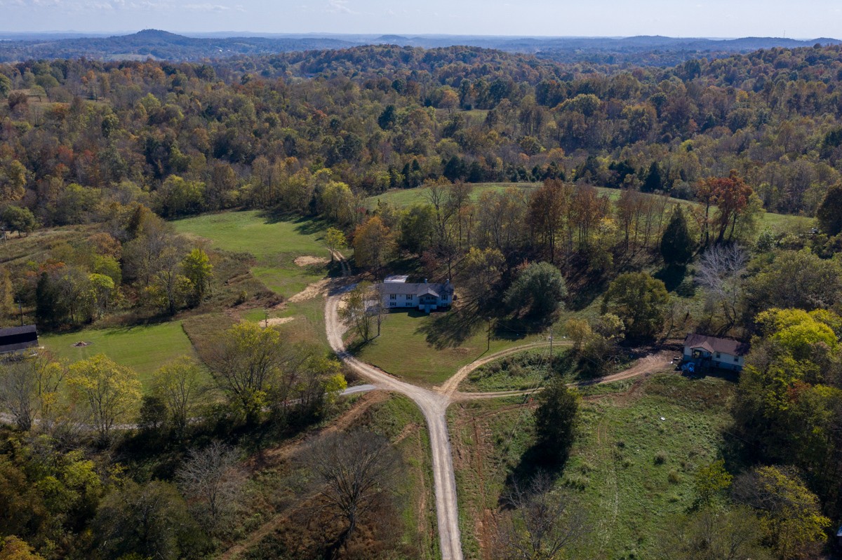 300 Garrison Branch Road Cottontown, TN 37048 - Photo 2 of 50 an aerial view of a house with a yard