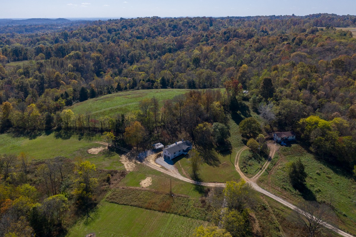 300 Garrison Branch Road Cottontown, TN 37048 - Photo 3 of 50 an aerial view of a house with a yard