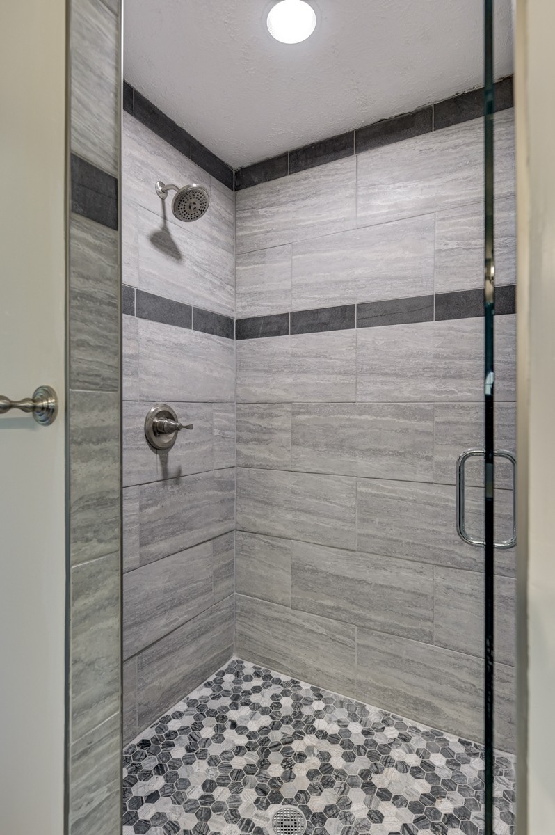 300 Garrison Branch Road Cottontown, TN 37048 - Photo 28 of 50 a bathroom with a shower