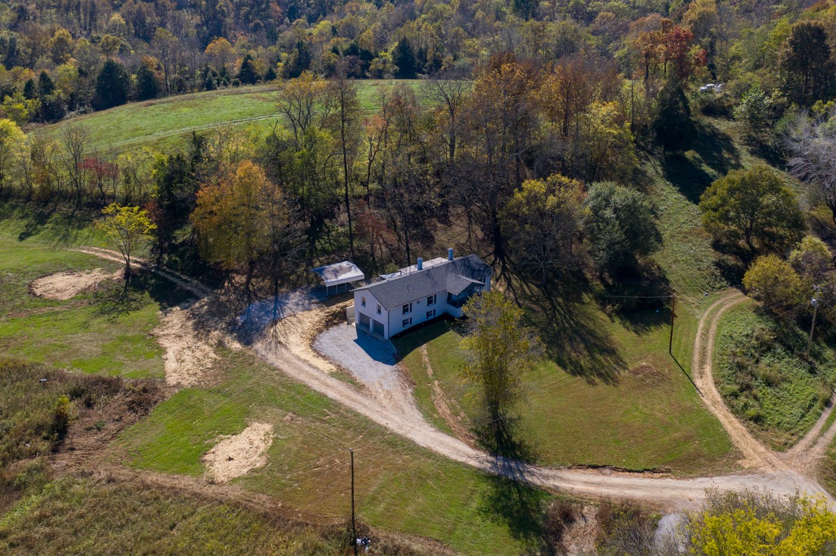 300 Garrison Branch Road Cottontown, TN 37048 - Photo 4 of 50 a view of a lake from a yard