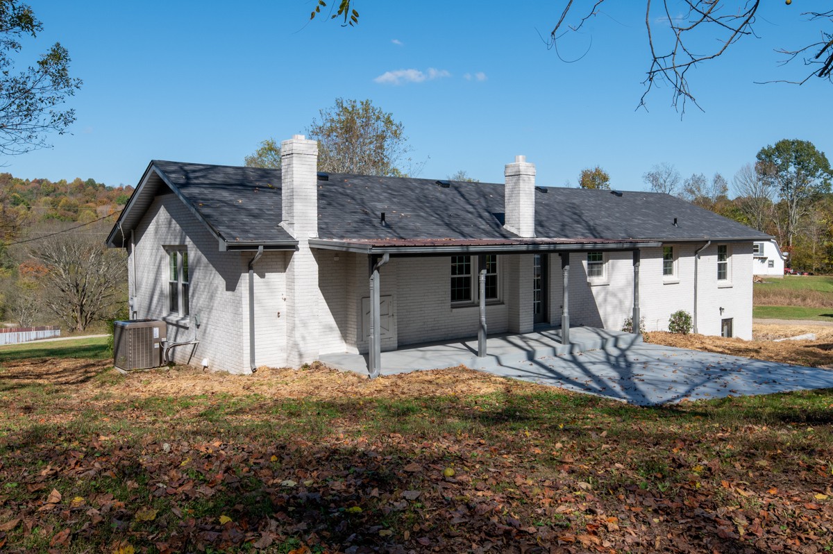 300 Garrison Branch Road Cottontown, TN 37048 - Photo 41 of 50 a front view of a house with a yard