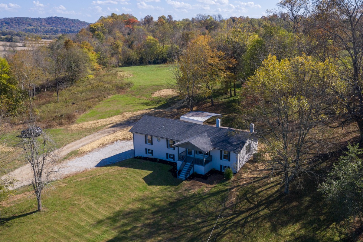 300 Garrison Branch Road Cottontown, TN 37048 - Photo 7 of 50 a view of a house with a yard