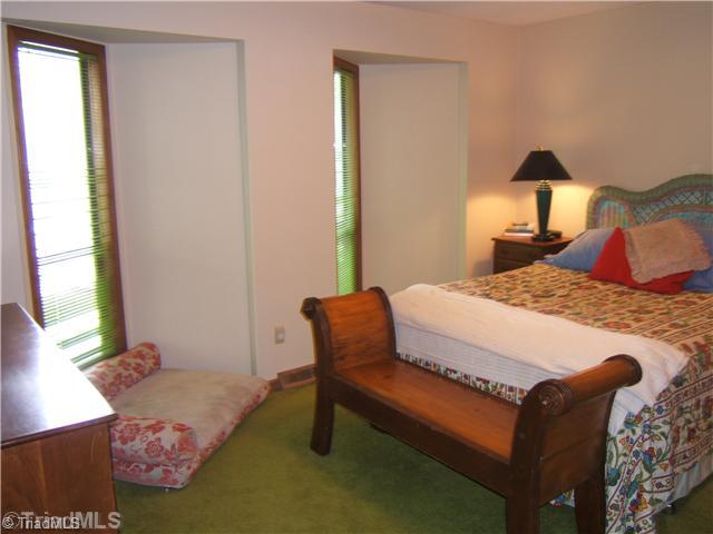 8805 Kings Tree Road Lewisville, NC 27023 - Photo 12 of 16 2nd Bedroom. Notice Triangular Window Feature