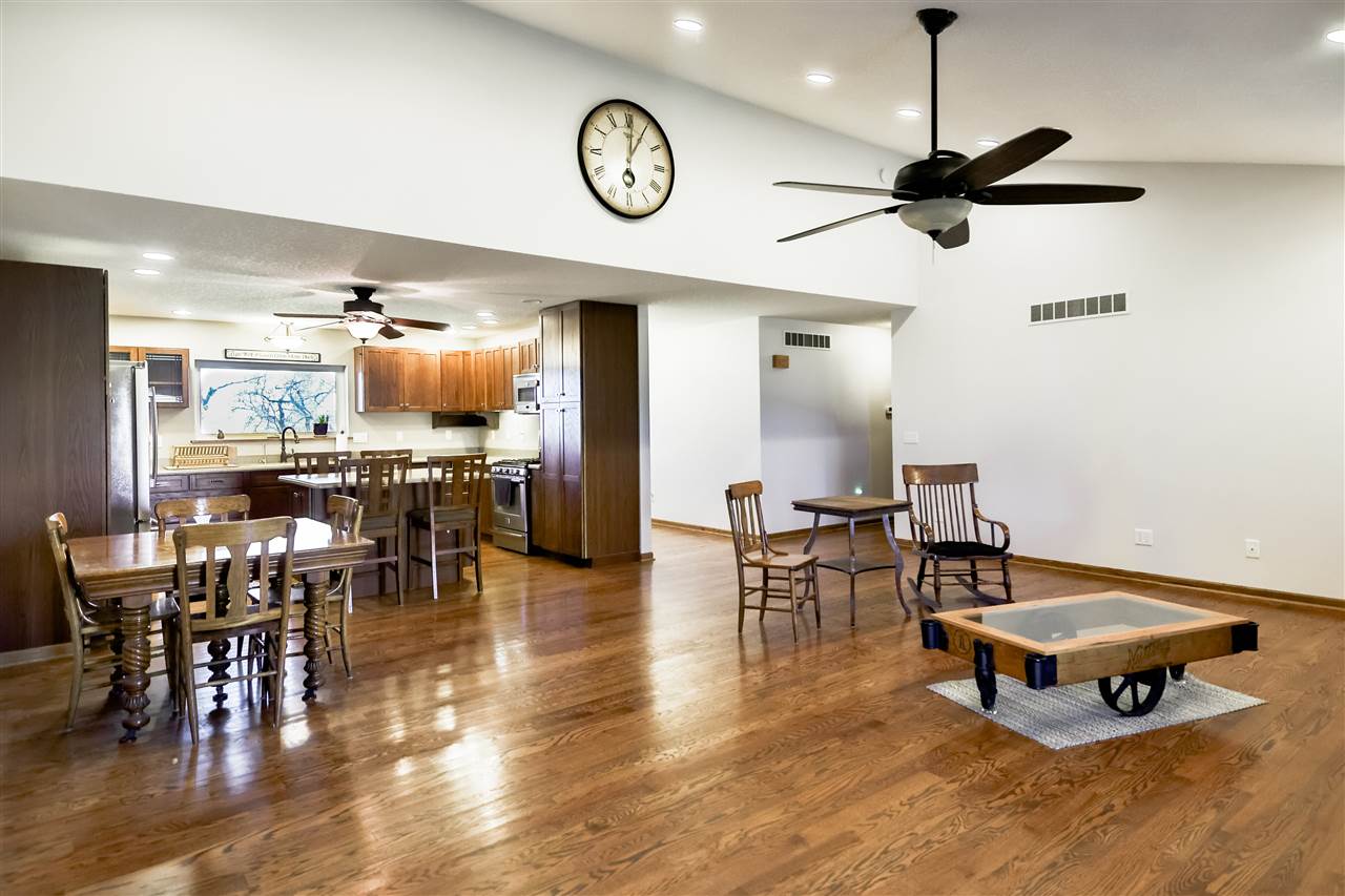 5776 Daysville Road Oregon, IL 61061 - Photo 17 of 34 a living room with furniture a clock on wall and a clock