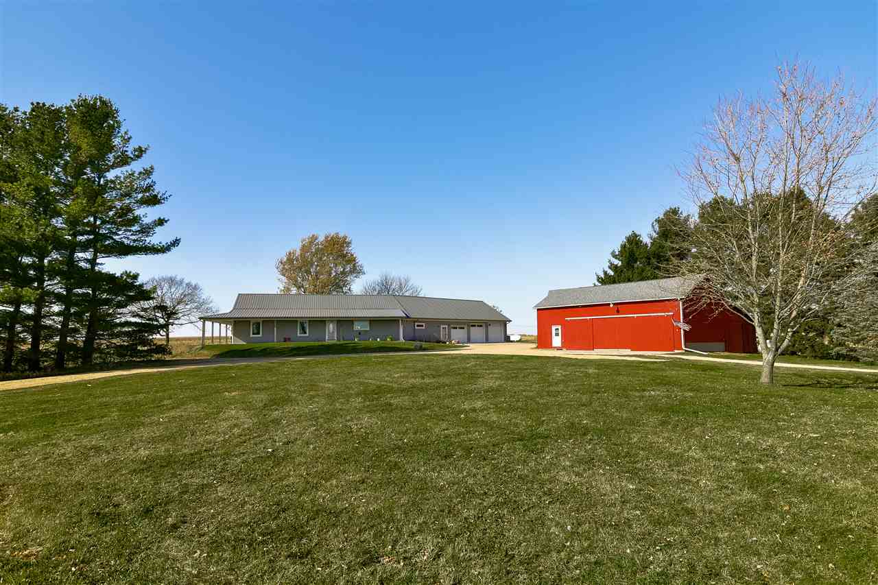 5776 Daysville Road Oregon, IL 61061 - Photo 2 of 34 a front view of a house with a yard