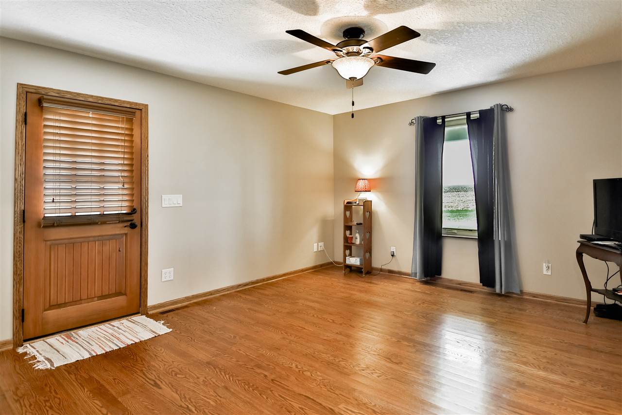 5776 Daysville Road Oregon, IL 61061 - Photo 31 of 34 a view of an empty room with a window and wooden floor
