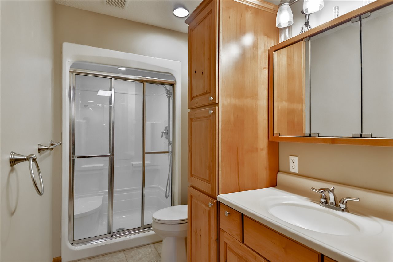 5776 Daysville Road Oregon, IL 61061 - Photo 34 of 34 a bathroom with a sink a toilet and shower