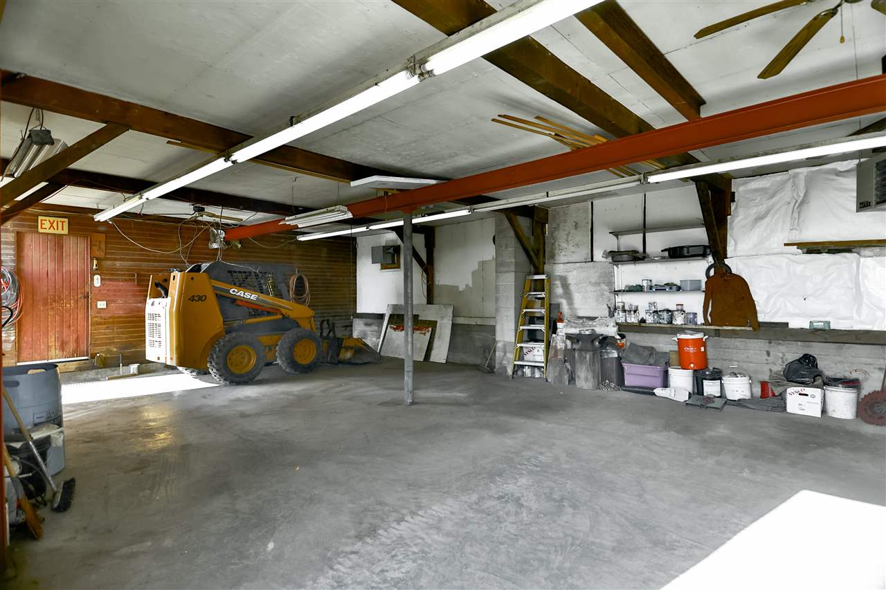 5776 Daysville Road Oregon, IL 61061 - Photo 5 of 34 a view of a garage with gym equipment