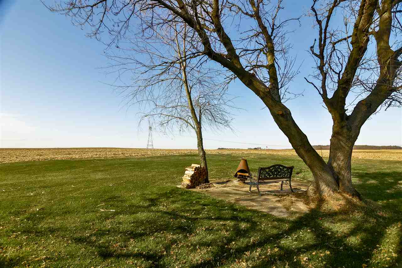 5776 Daysville Road Oregon, IL 61061 - Photo 8 of 34 a view of a lake with a yard