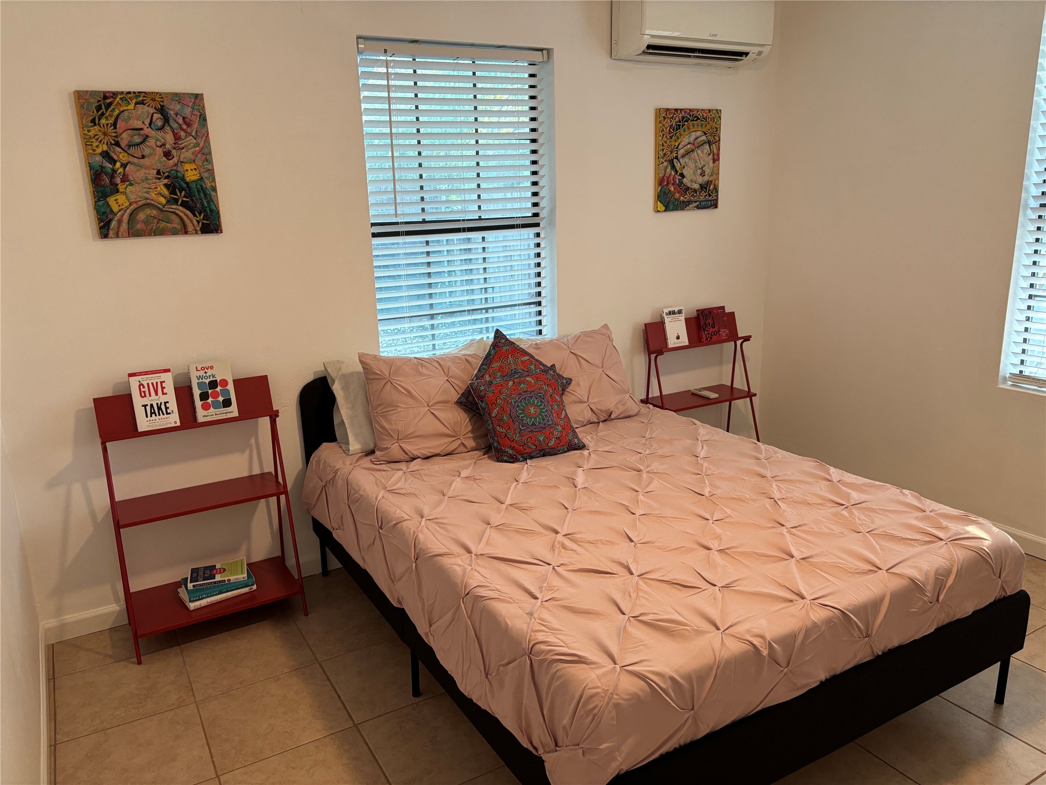 5414 Bolm Road, Unit B Austin, TX 78721 - Photo 5 of 8 Well-lit and tranquil, this bedroom provides a serene retreat.