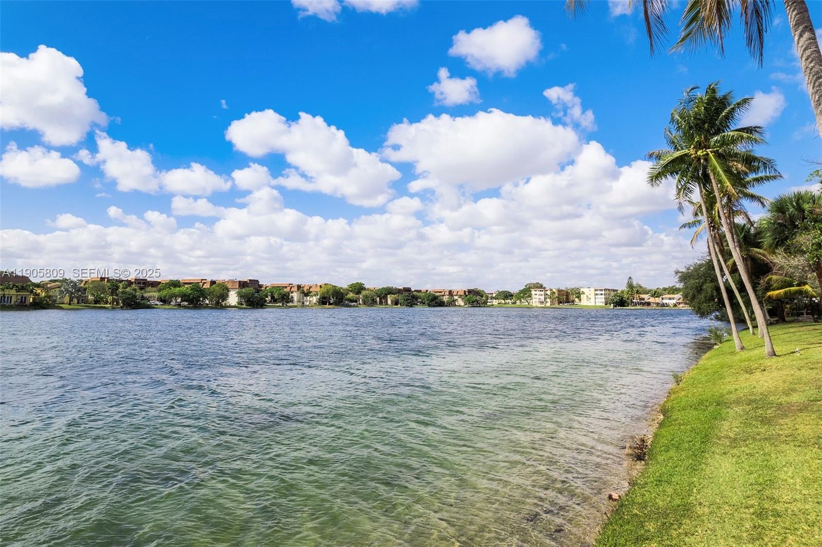 770 Northeast 199th Street, Unit 106F Miami, FL 33179 - Photo 15 of 25 a view of a lake