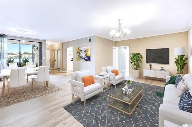 a living room with fireplace furniture and a flat screen tv