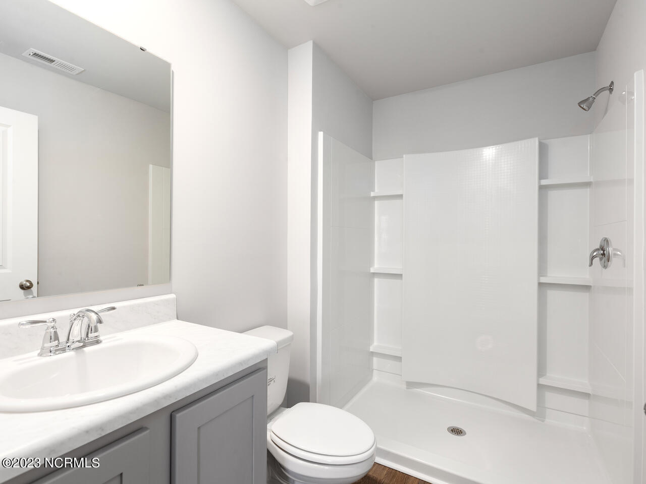 398 Folkstone Road, Unit LOT 1005 Holly Ridge, NC 28445 - Photo 21 of 37 bathroom downstairs