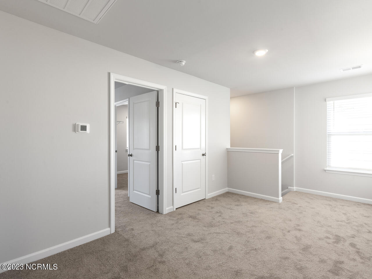 398 Folkstone Road, Unit LOT 1005 Holly Ridge, NC 28445 - Photo 23 of 37 upstairs living