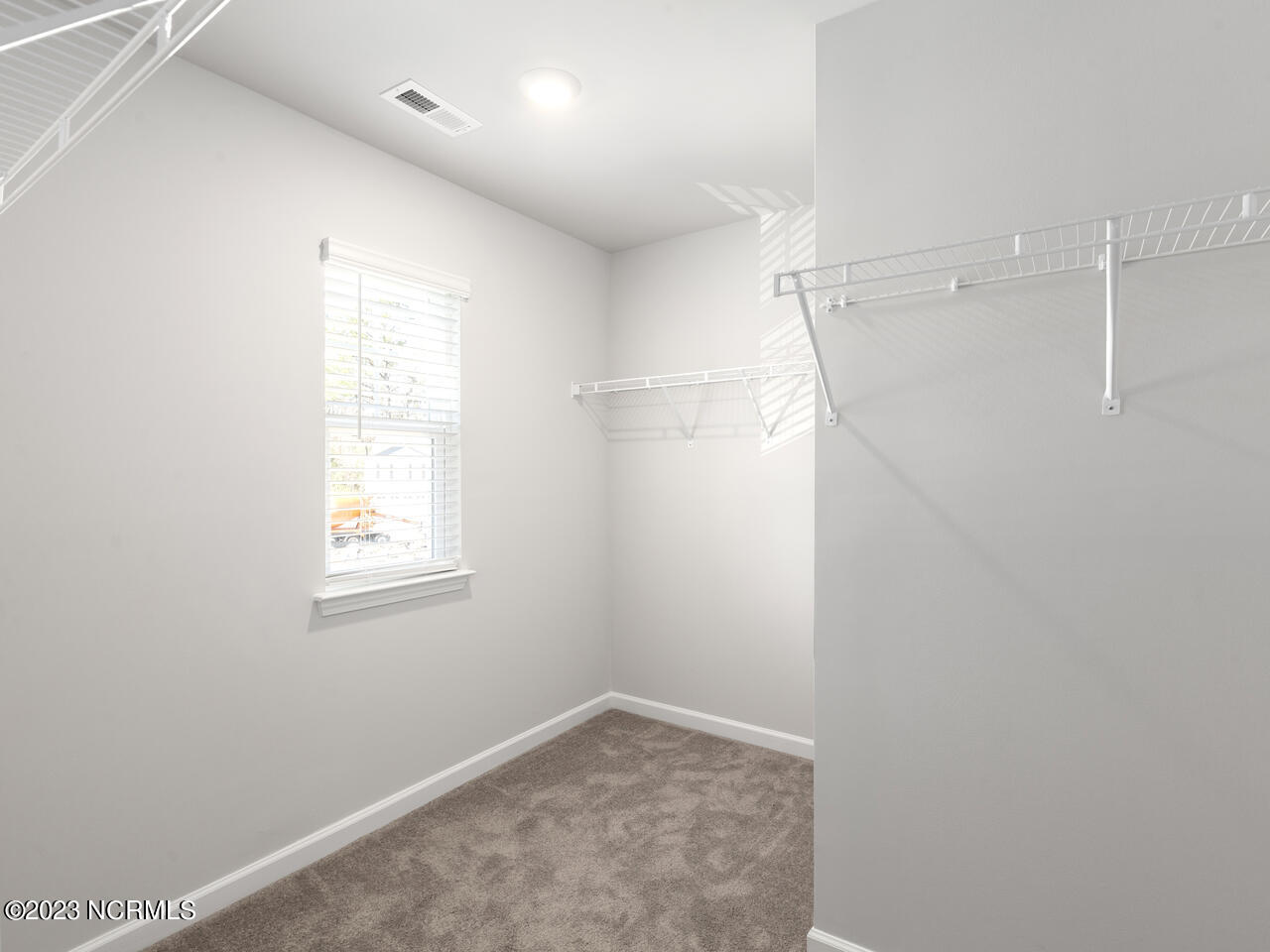 398 Folkstone Road, Unit LOT 1005 Holly Ridge, NC 28445 - Photo 31 of 37 primary closet