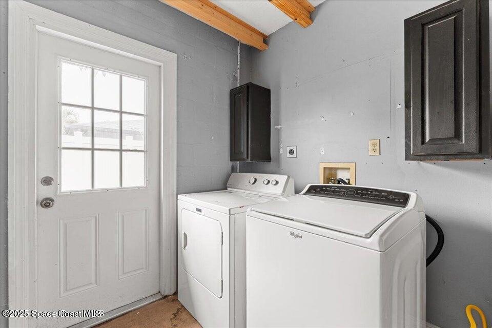 1527 Spruce Road Melbourne, FL 32935 - Photo 11 of 24 laundry garage