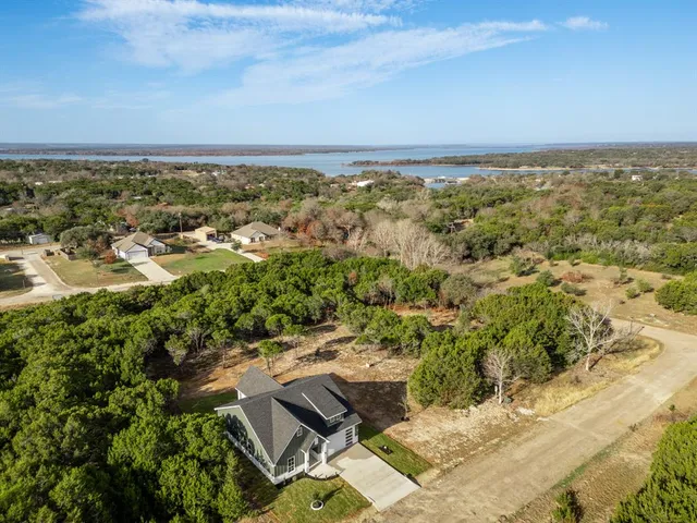 an aerial view of residential house with outdoor space