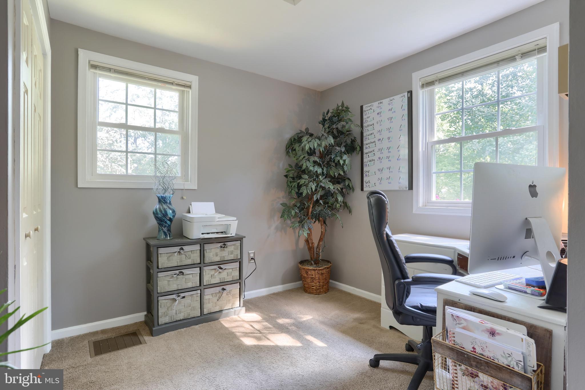 1586 Loop Road Manheim, PA 17545 - Photo 24 of 42 a view of a workspace with furniture and a window