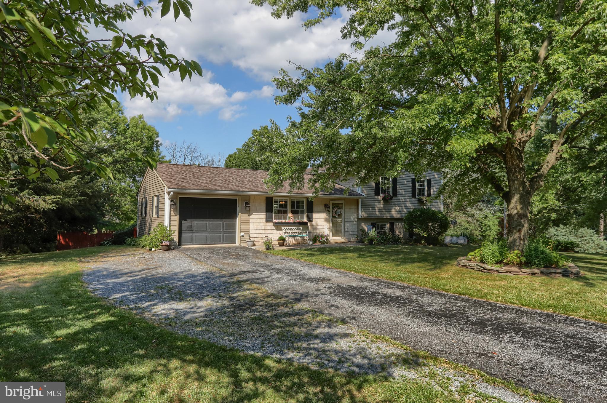 1586 Loop Road Manheim, PA 17545 - Photo 5 of 42 a view of a house with backyard and sitting area
