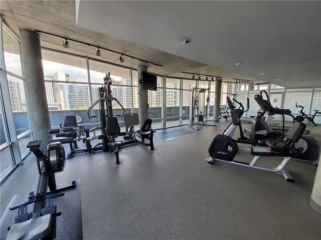 845 Spring Street Northwest, Unit 104 Atlanta, GA 30308 - Photo 23 of 40 a view of a room with gym equipment