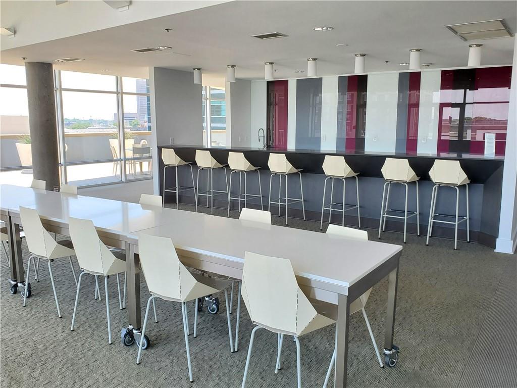 845 Spring Street Northwest, Unit 104 Atlanta, GA 30308 - Photo 28 of 40 a view of a dining room with furniture