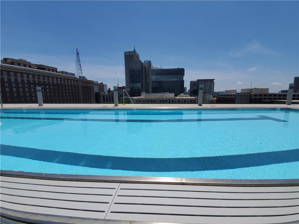 845 Spring Street Northwest, Unit 104 Atlanta, GA 30308 - Photo 34 of 40 a view of a balcony with city view