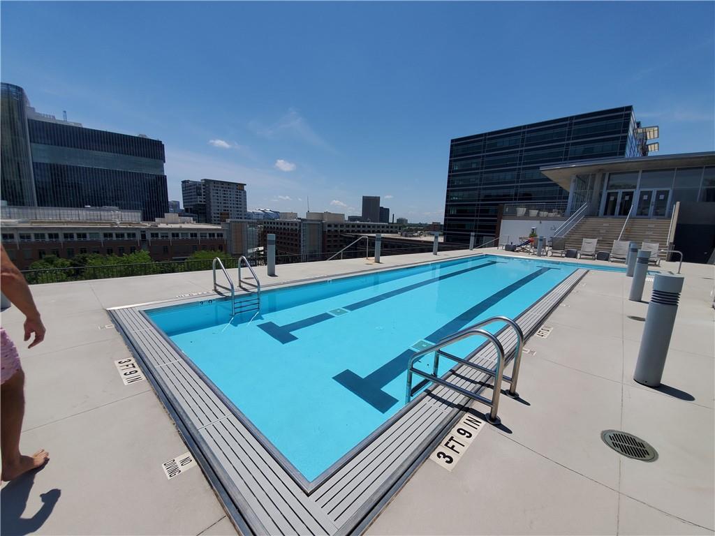 845 Spring Street Northwest, Unit 104 Atlanta, GA 30308 - Photo 35 of 40 a room with furniture pool table and chairs