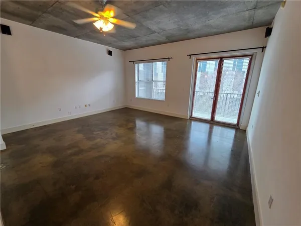 a view of a house with a and a ceiling fan