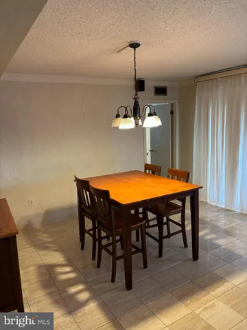 a table and chairs in a room