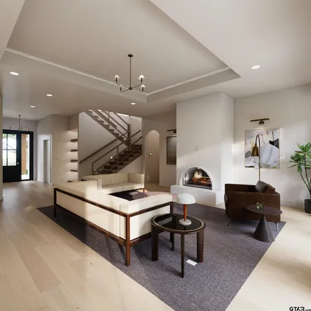 a living room with furniture and a piano