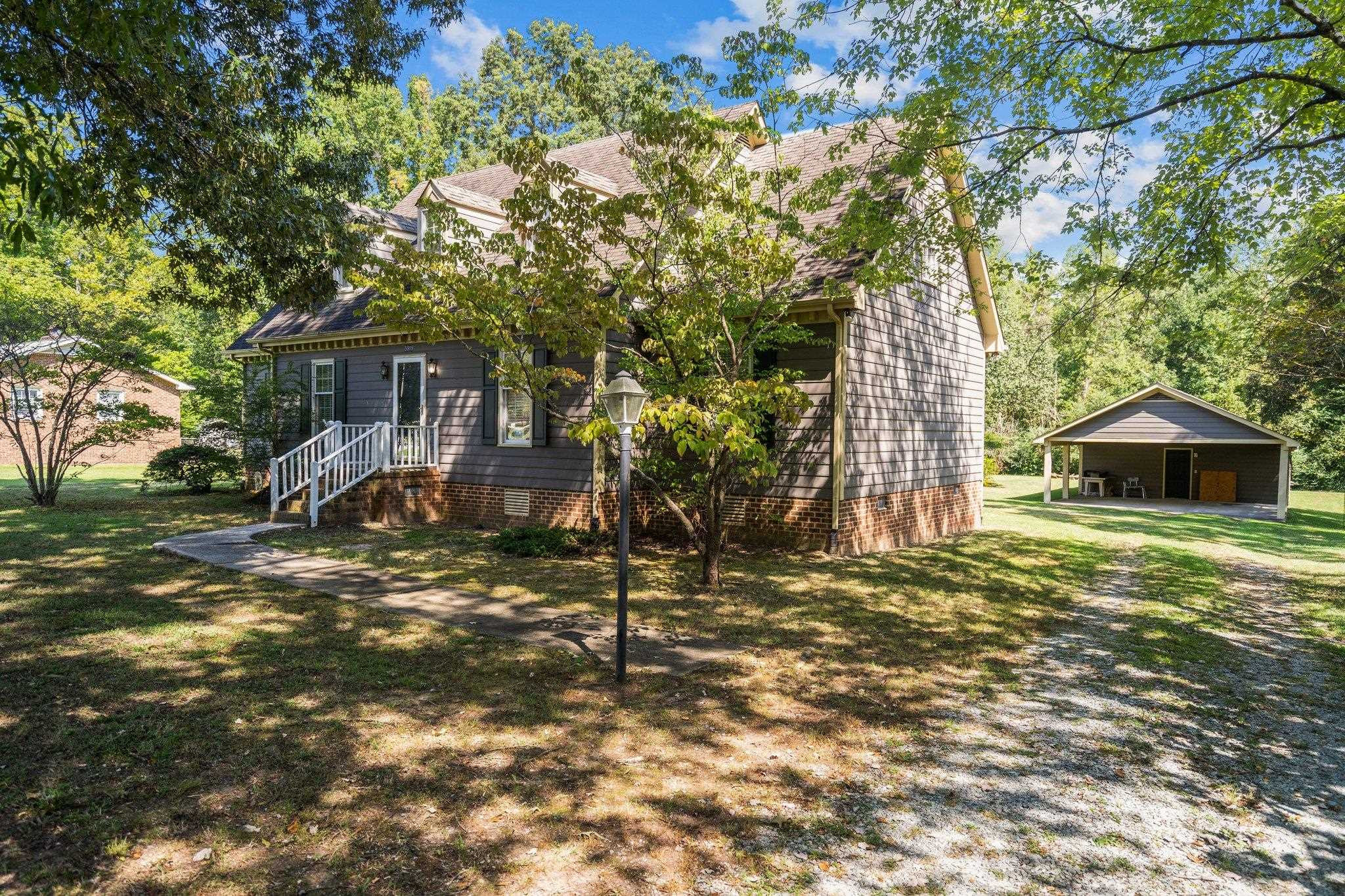 5909 Loyal Avenue Durham, NC 27713 - Photo 1 of 40 a view of a house with a yard