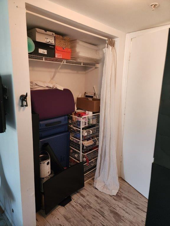 460 South Park Road, Unit 6209 Hollywood, FL 33021 - Photo 14 of 25 a room with walk in closet and wooden floor