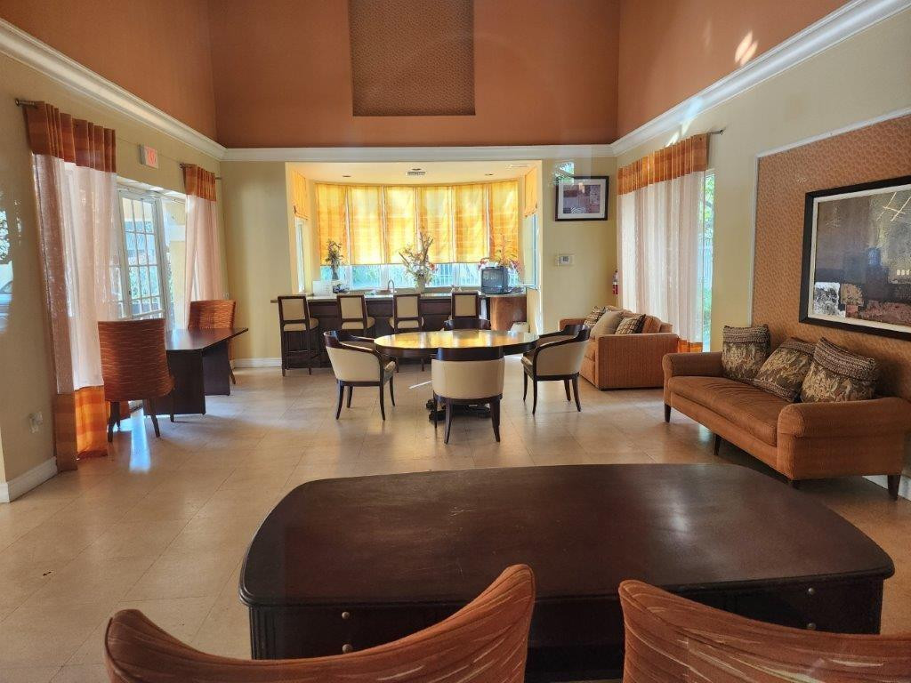 460 South Park Road, Unit 6209 Hollywood, FL 33021 - Photo 21 of 25 a living room with couches and a large window