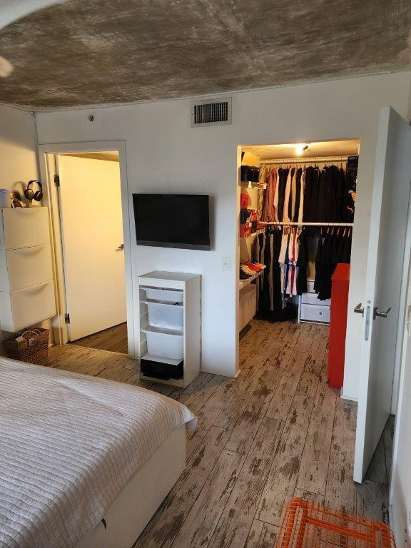 460 South Park Road, Unit 6209 Hollywood, FL 33021 - Photo 9 of 25 a bed room with a bed and a television