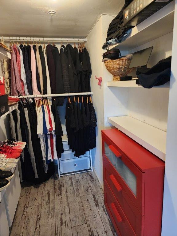 460 South Park Road, Unit 6209 Hollywood, FL 33021 - Photo 10 of 25 a view of walk in closet with clothes and shoes