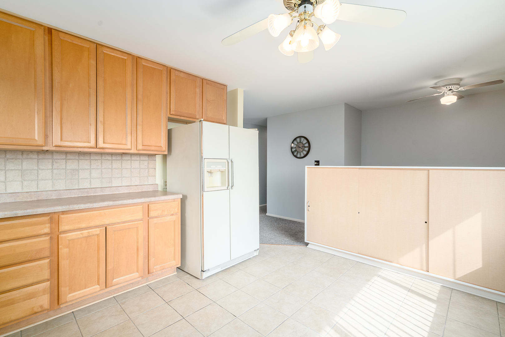 9 Ambassador Avenue Romeoville, IL 60446 - Photo 14 of 26 a utility room with cabinets washer and dryer