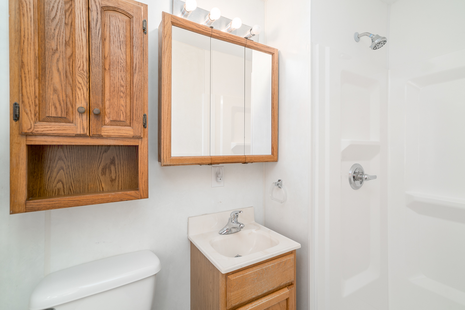 9 Ambassador Avenue Romeoville, IL 60446 - Photo 22 of 26 a bathroom with a sink and a toilet