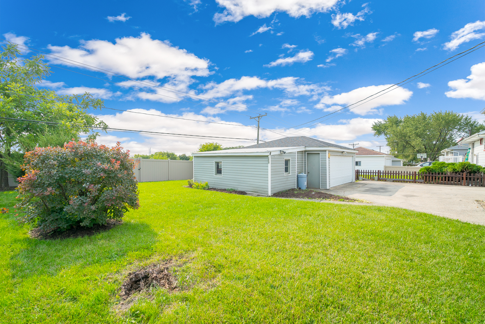 9 Ambassador Avenue Romeoville, IL 60446 - Photo 6 of 26 a view of a backyard with basket ball court