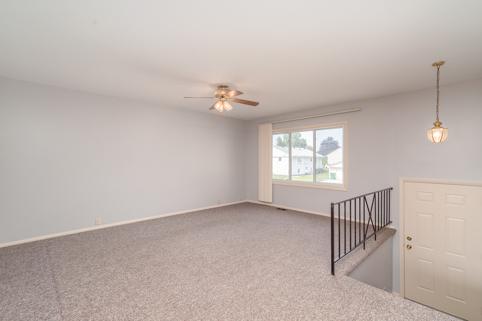 9 Ambassador Avenue Romeoville, IL 60446 - Photo 10 of 26 wooden floor in an empty room with a window