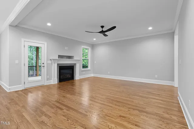 a kitchen with kitchen island a counter space a sink and stainless steel appliances