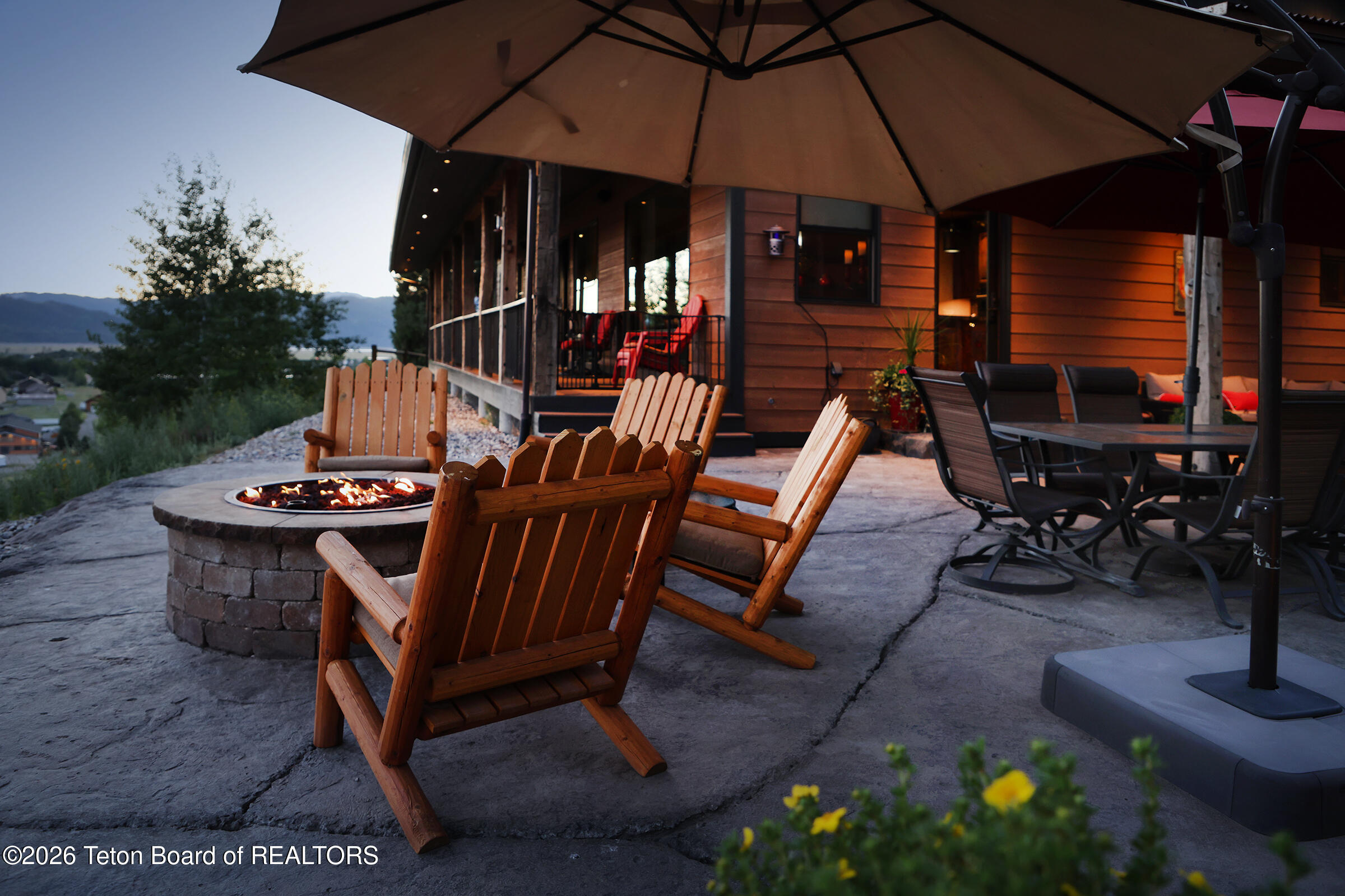 166 Aspen Ridge Trail Alpine, WY 83128 - Photo 41 of 50 40_166_Aspen_Ridge_Trail_BackPatioPitVie