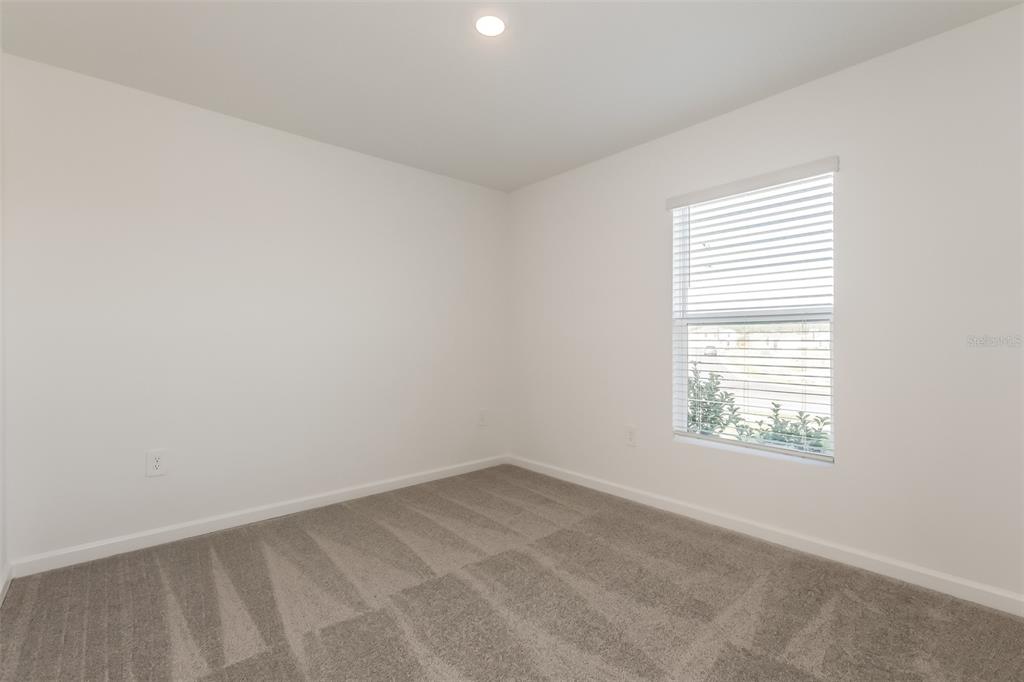 2770 Pennachio Dr Lake Lake Wales, FL 33853 - Photo 11 of 15 an empty room with a window