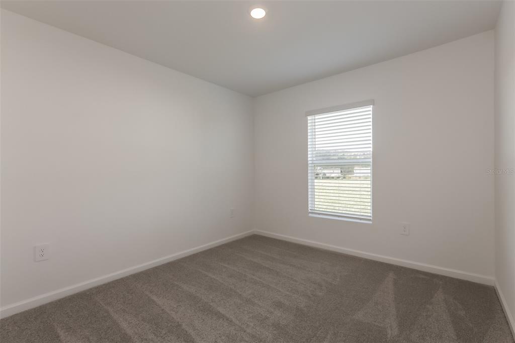 2770 Pennachio Dr Lake Lake Wales, FL 33853 - Photo 5 of 15 an empty room with a window