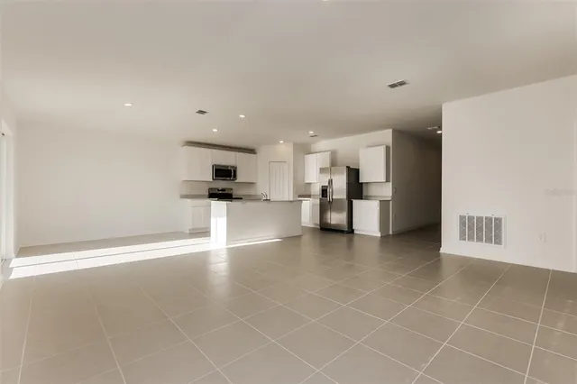 a view of a kitchen with a sink