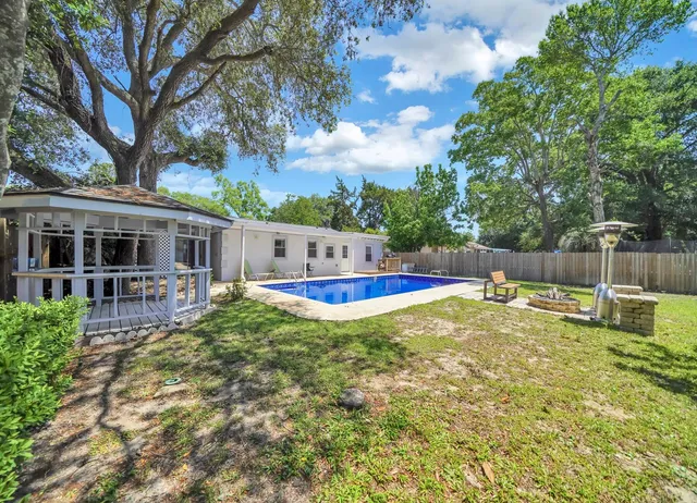 a view of a house with swimming pool