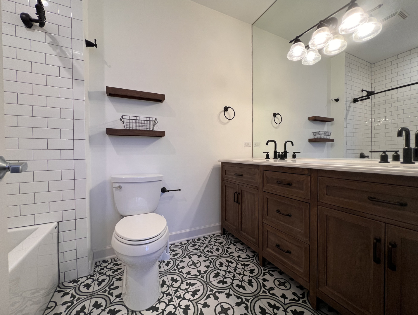 Undisclosed Address Chicago, IL 60610 - Photo 11 of 12 a bathroom with a toilet sink and mirror