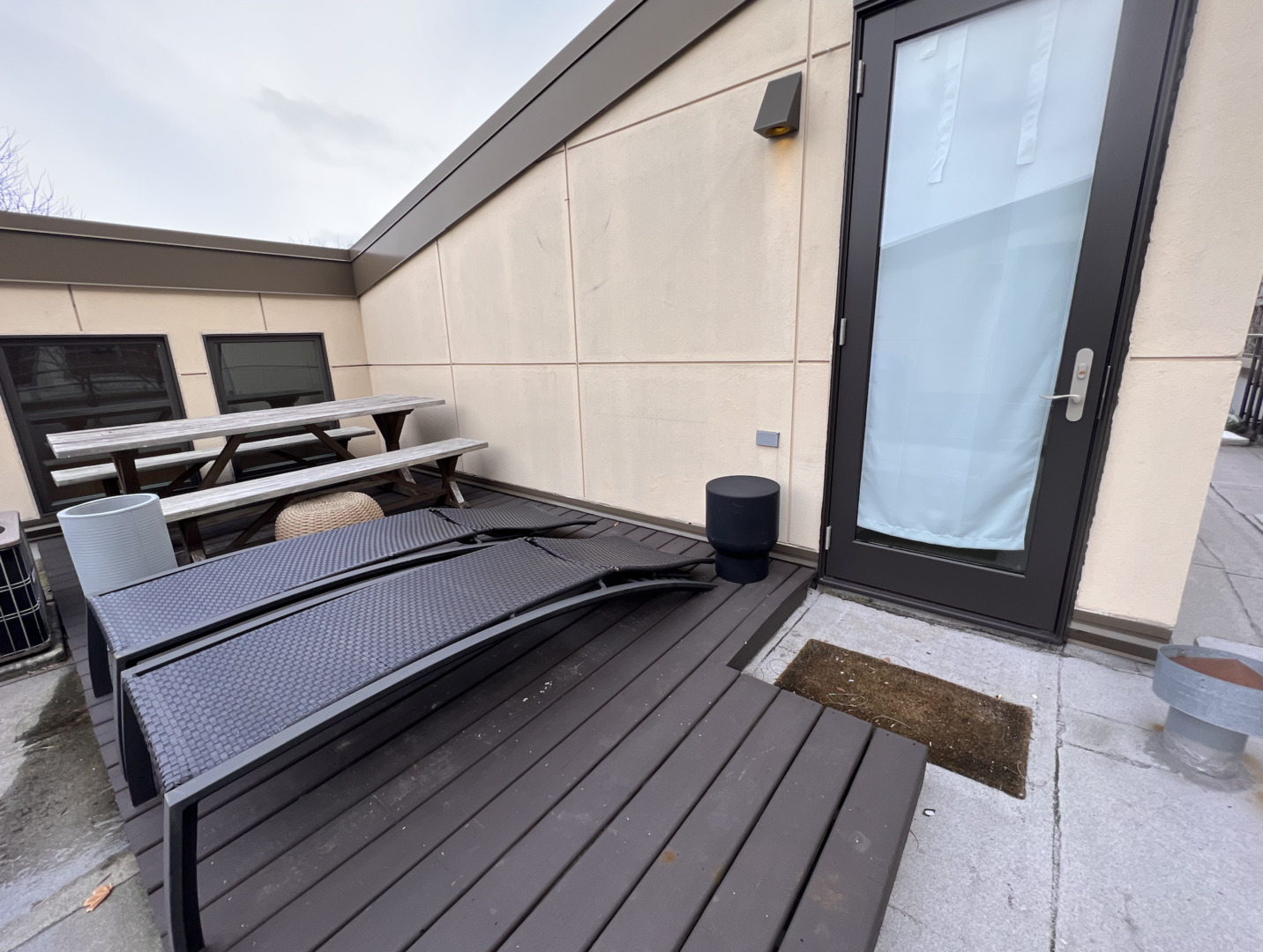 Undisclosed Address Chicago, IL 60610 - Photo 12 of 12 a view of a living room with wooden floor and a flat screen tv